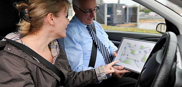 driving instructor teaching roundabouts